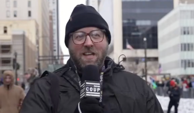 Zach Roberts of Status Coup News